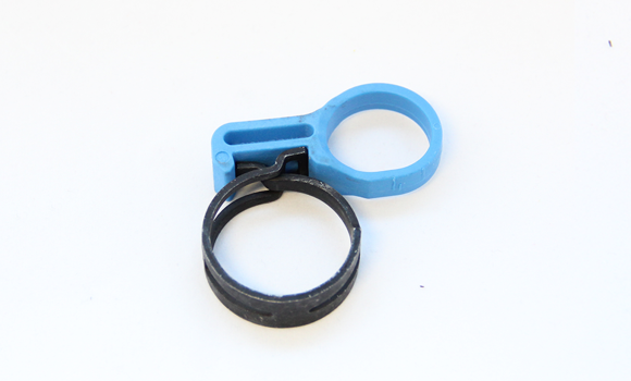 Pre-stressed spring band clamp